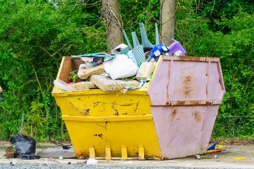 A large skip bin placed in a Twickenham neighborhood.