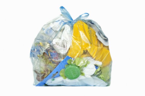 Man and van preparing for a garden clearance in suburban street